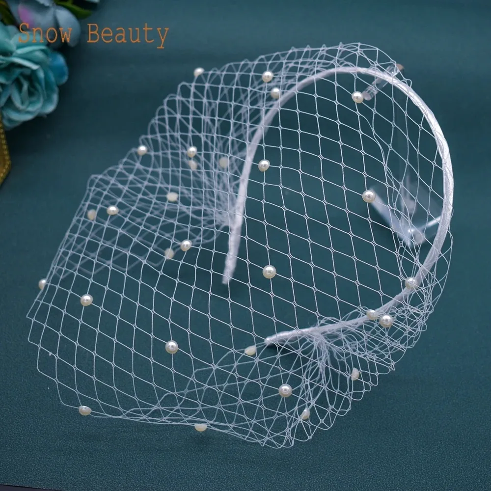 The Birdcage Veil photo 3