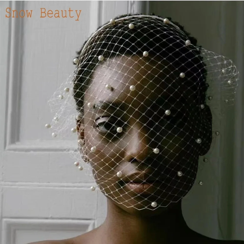 The Birdcage Veil photo 4