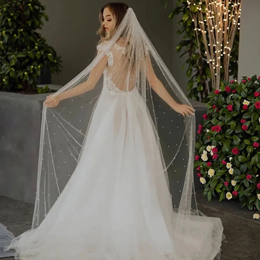 The Pearl Veil, Scattered pearls that catch every light in the room